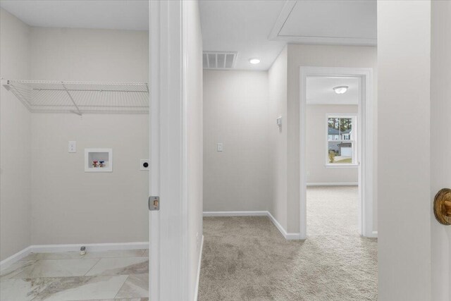 washroom featuring baseboards, visible vents, laundry area, electric dryer hookup, and washer hookup