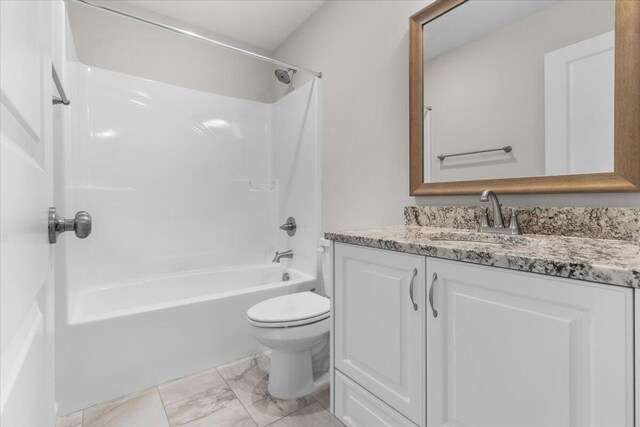 bathroom with shower / bath combination, toilet, vanity, and marble finish floor