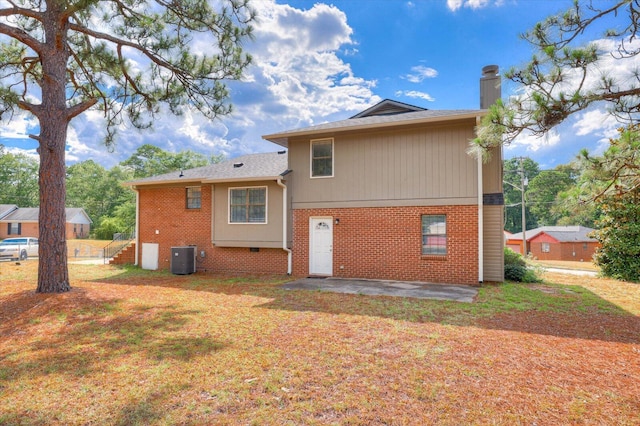 rear view of property with a patio