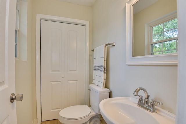 bathroom with a sink and toilet