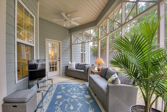 sunroom with a wealth of natural light, ceiling fan, and wooden ceiling