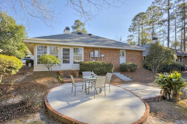 back of house with a patio area