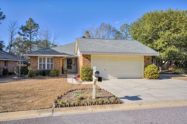 ranch-style house featuring a garage