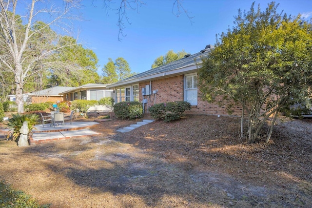 view of front of house featuring a patio