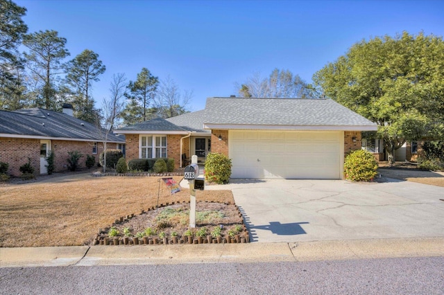 single story home with a garage