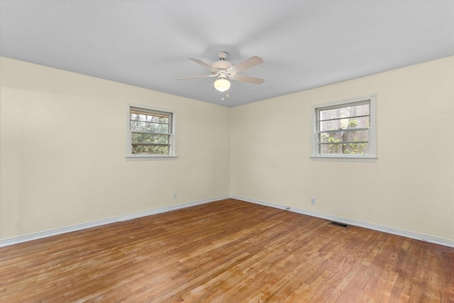 2216 Silverdale Rd, Augusta, GA 30906 - spare room with light wood-style flooring, a ceiling fan, and baseboards