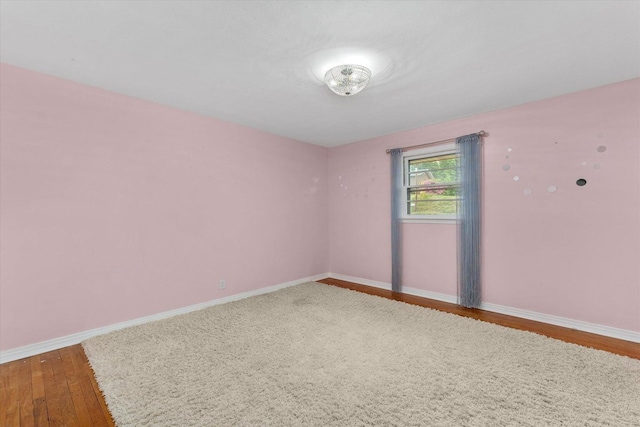 2216 Silverdale Rd, Augusta, GA 30906 - spare room featuring wood finished floors and baseboards