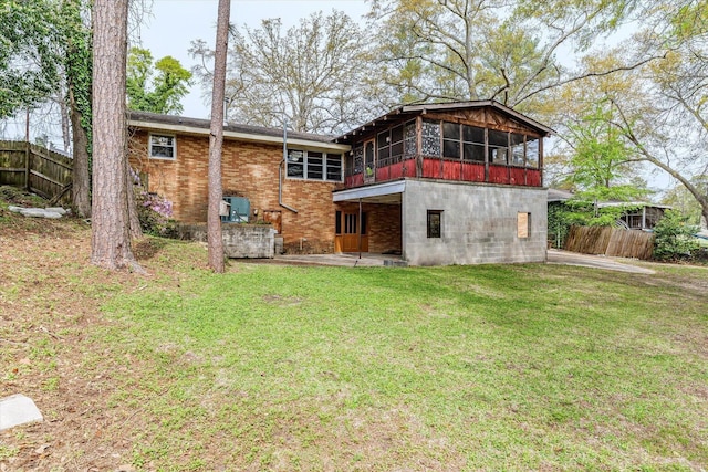 2216 Silverdale Rd, Augusta, GA 30906 - rear view of house with a sunroom