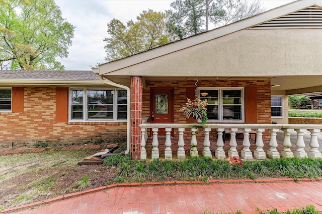 2216 Silverdale Rd, Augusta, GA 30906 - view of exterior entry featuring a porch and brick siding