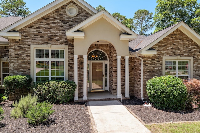 1382 Shadow Oak Dr, Evans, GA 30809 - doorway to property featuring brick siding and roof with shingles