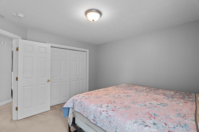 1382 Shadow Oak Dr, Evans, GA 30809 - bedroom with light colored carpet and a closet