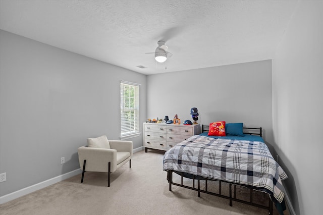 1382 Shadow Oak Dr, Evans, GA 30809 - bedroom with baseboards, carpet flooring, ceiling fan, and a textured ceiling