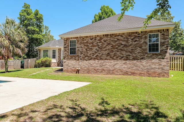 1382 Shadow Oak Dr, Evans, GA 30809 - rear view of property featuring a patio area, roof with shingles, and brick siding