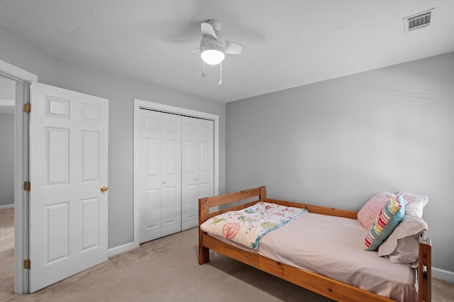 1382 Shadow Oak Dr, Evans, GA 30809 - bedroom with light colored carpet, baseboards, a closet, and ceiling fan