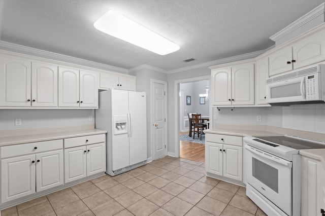 1382 Shadow Oak Dr, Evans, GA 30809 - kitchen featuring white appliances, white cabinets, crown molding, light countertops, and a textured ceiling