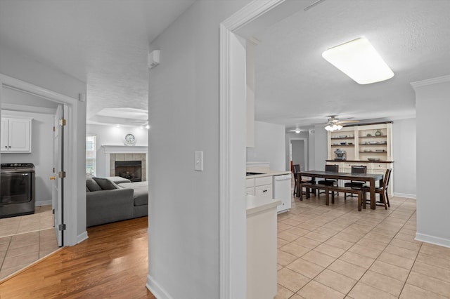 1382 Shadow Oak Dr, Evans, GA 30809 - corridor with washer / clothes dryer, light tile patterned floors, and baseboards