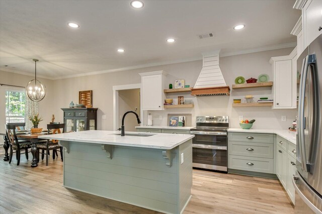 kitchen featuring white cabinetry, hanging light fixtures, stainless steel appliances, a chandelier, and custom range hood