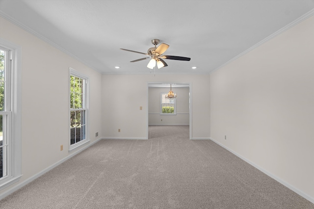 3076 Westwood Rd, Augusta, GA 30909 - spare room featuring crown molding, light colored carpet, a ceiling fan, a chandelier, and recessed lighting