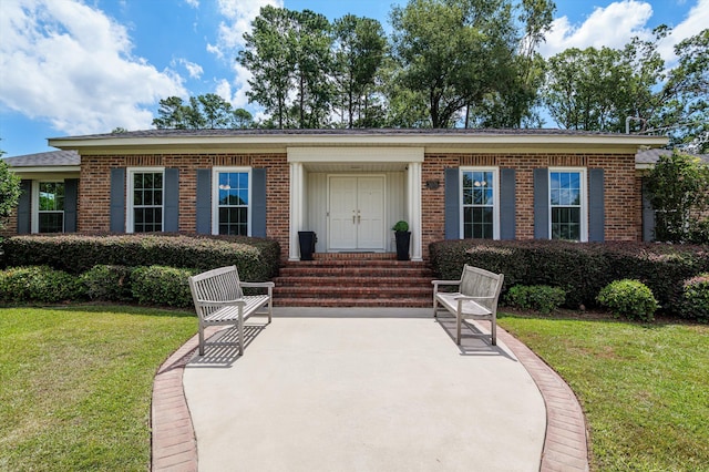 3076 Westwood Rd, Augusta, GA 30909 - single story home with a front yard, entry steps, and brick siding