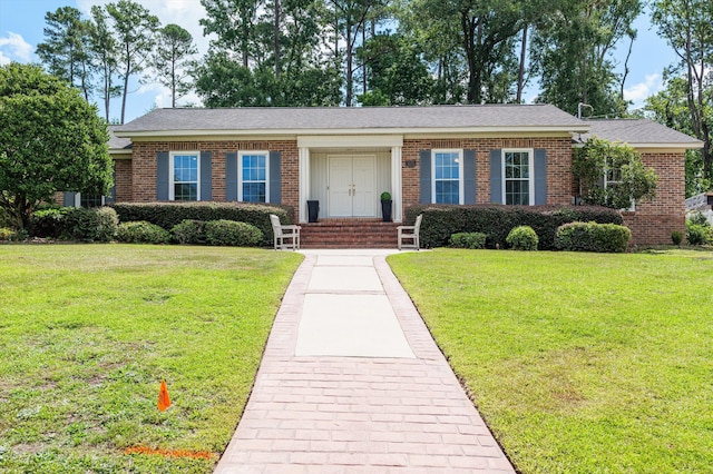 3076 Westwood Rd, Augusta, GA 30909 - ranch-style house with a front yard and brick siding