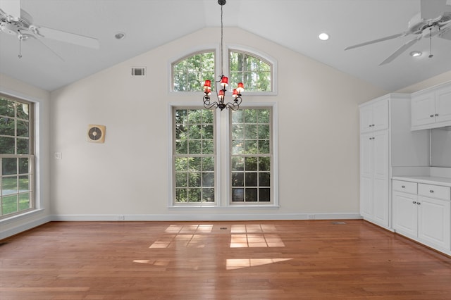 3076 Westwood Rd, Augusta, GA 30909 - unfurnished dining area featuring a ceiling fan, a chandelier, lofted ceiling, light wood finished floors, and recessed lighting