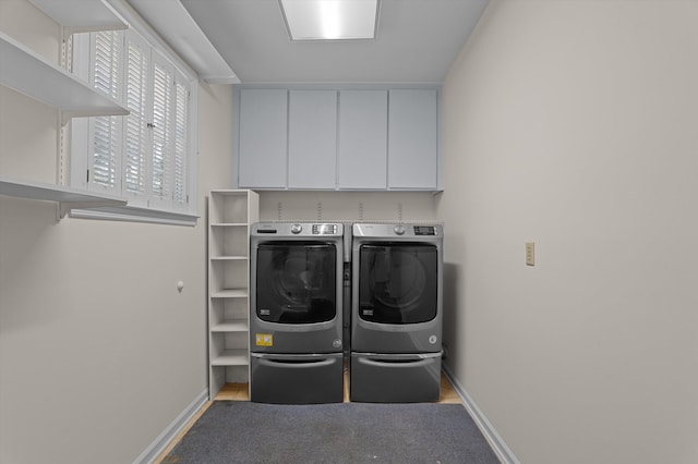 3076 Westwood Rd, Augusta, GA 30909 - washroom featuring washing machine and clothes dryer and cabinet space