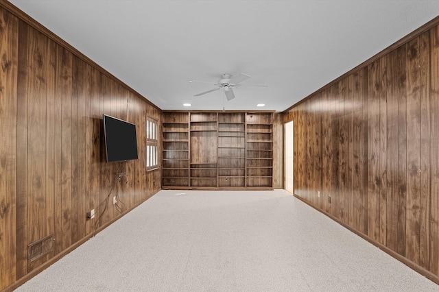3076 Westwood Rd, Augusta, GA 30909 - unfurnished room with ceiling fan, wood walls, carpet, built in features, and recessed lighting