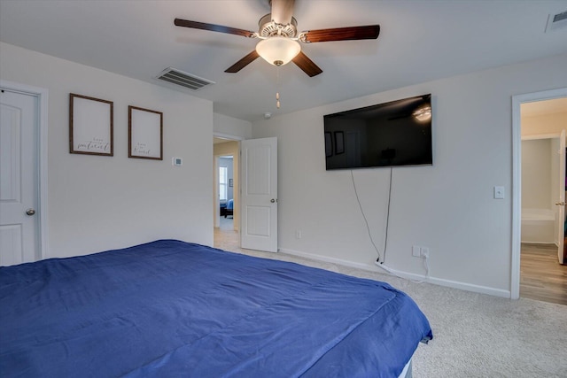 bedroom with ceiling fan and light colored carpet