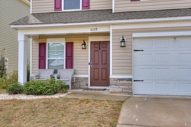 entrance to property with a garage