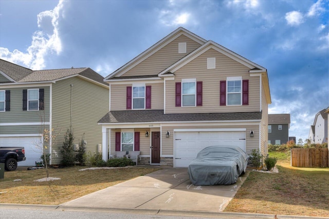 view of front facade featuring a front lawn and a garage