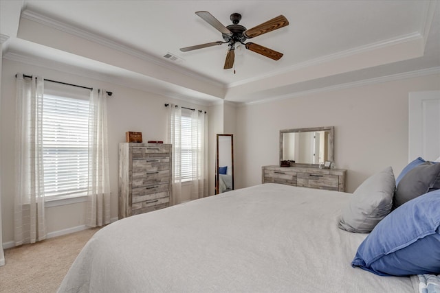 867 Williford Run Dr, Grovetown, GA 30813 - bedroom with crown molding, light carpet, a tray ceiling, baseboards, and a ceiling fan