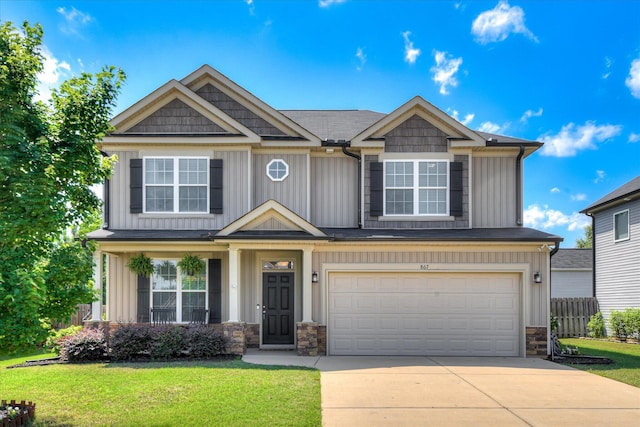 867 Williford Run Dr, Grovetown, GA 30813 - craftsman inspired home with stone siding, a garage, driveway, and board and batten siding