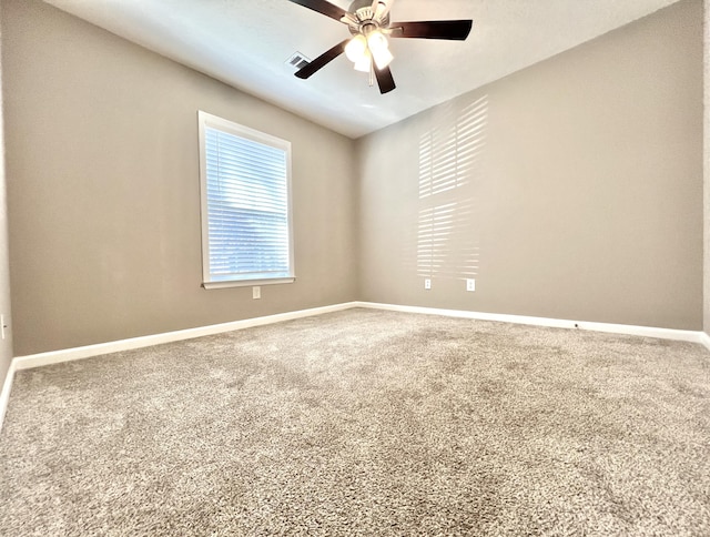 empty room with carpet and ceiling fan