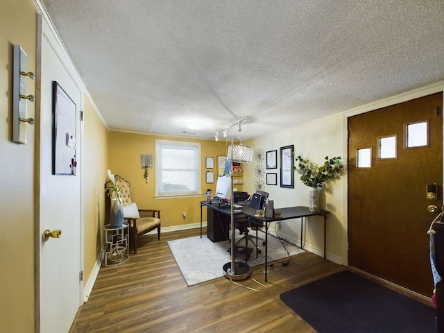 102 Ellis St, Wrens, GA 30833 - office area featuring dark hardwood / wood-style flooring, crown molding, and a textured ceiling