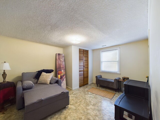102 Ellis St, Wrens, GA 30833 - bedroom with a textured ceiling and a closet