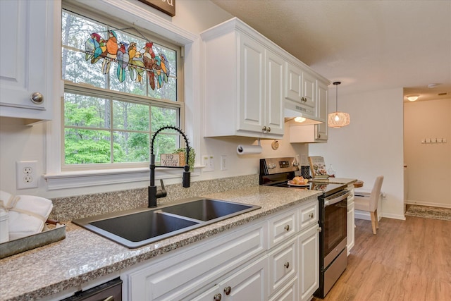 212 Links Pl, Mccormick, SC 29835 - kitchen with electric stove, a sink, white cabinets, and under cabinet range hood