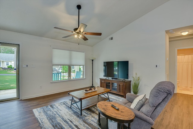 212 Links Pl, Mccormick, SC 29835 - living room featuring plenty of natural light, wood finished floors, lofted ceiling, a ceiling fan, and baseboards
