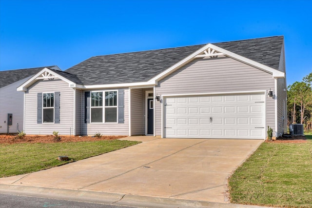 ranch-style house featuring central AC unit, a front yard, and a garage