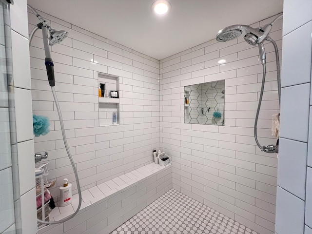 bathroom featuring tiled shower