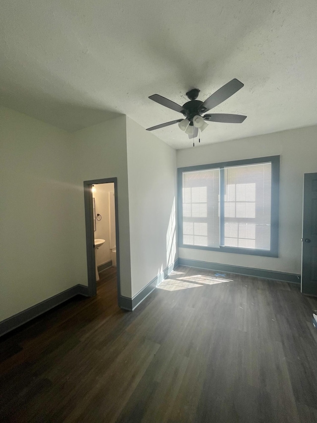 1835 Fenwick St, Augusta, GA 30904 - spare room featuring dark wood-style floors, ceiling fan, and a textured ceiling