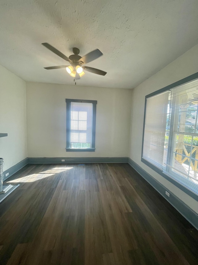 1835 Fenwick St, Augusta, GA 30904 - spare room featuring dark wood-style floors, a ceiling fan, and a textured ceiling