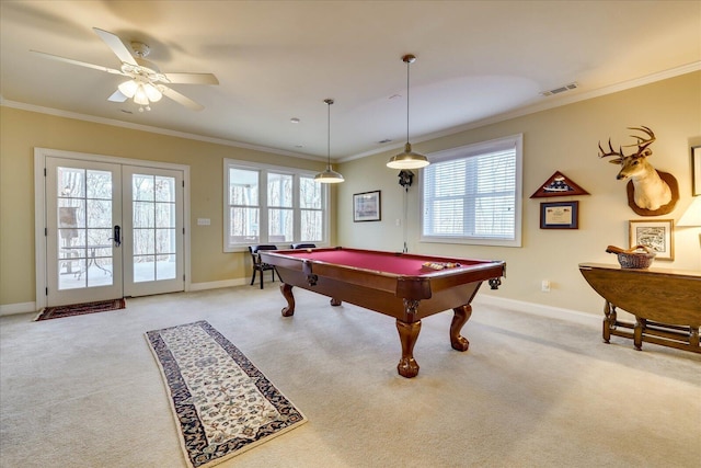 game room featuring ceiling fan, light colored carpet, crown molding, plenty of natural light, and pool table