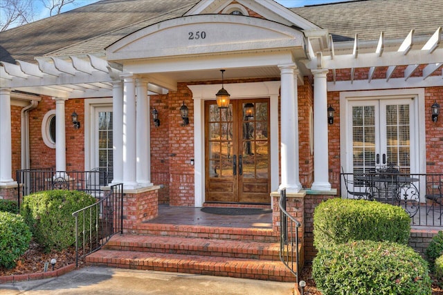 entrance to property featuring a porch