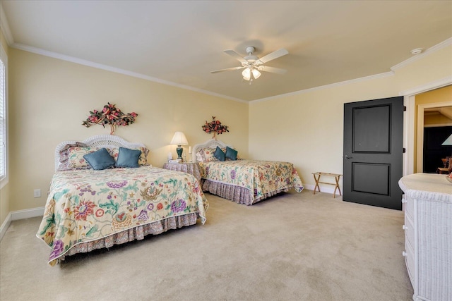 carpeted bedroom with ceiling fan and crown molding