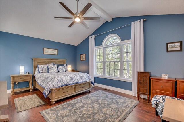 bedroom with lofted ceiling with beams, ceiling fan, and dark wood-type flooring