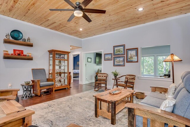 living room featuring crown molding, ceiling fan, wooden ceiling, and dark hardwood / wood-style floors