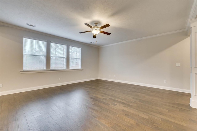 unfurnished room featuring crown molding, ceiling fan, and dark hardwood / wood-style flooring