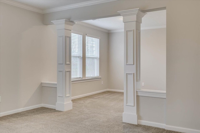 spare room with ornamental molding, light carpet, and ornate columns