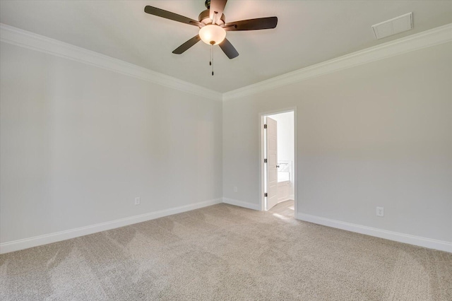 unfurnished room with carpet and ornamental molding