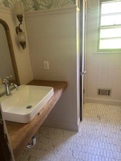 4521 Zola Dr, Evans, GA 30809 - bathroom with a sink and a shower
